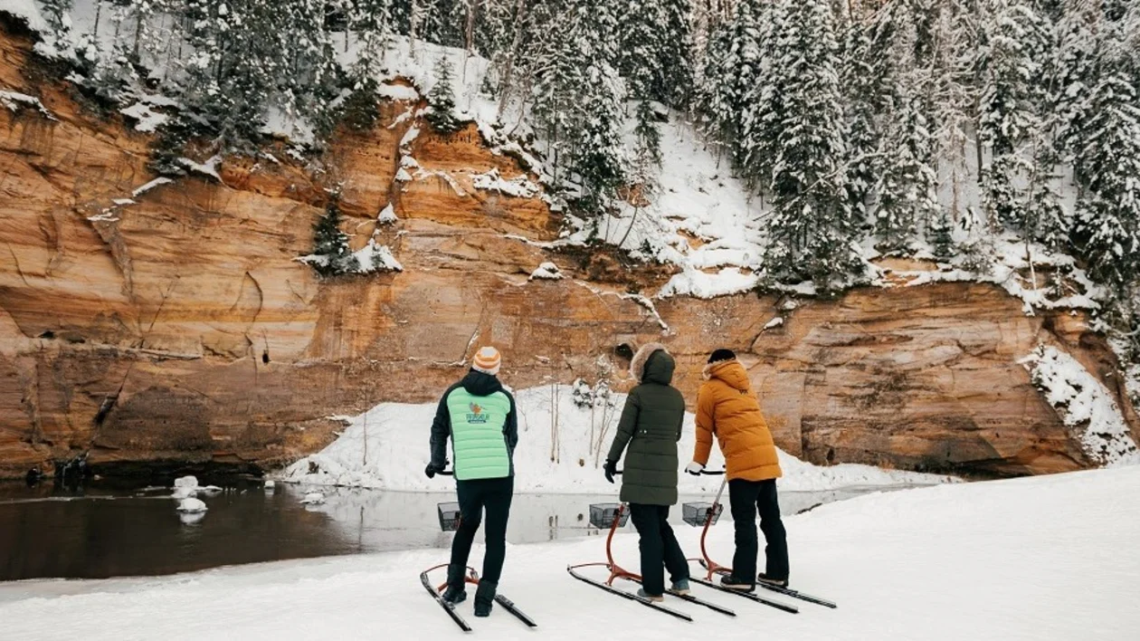 Go on a kicksled hike along the Taevaskoda sandstone outcrops. ©Rauno Liivand, Visit Estonia