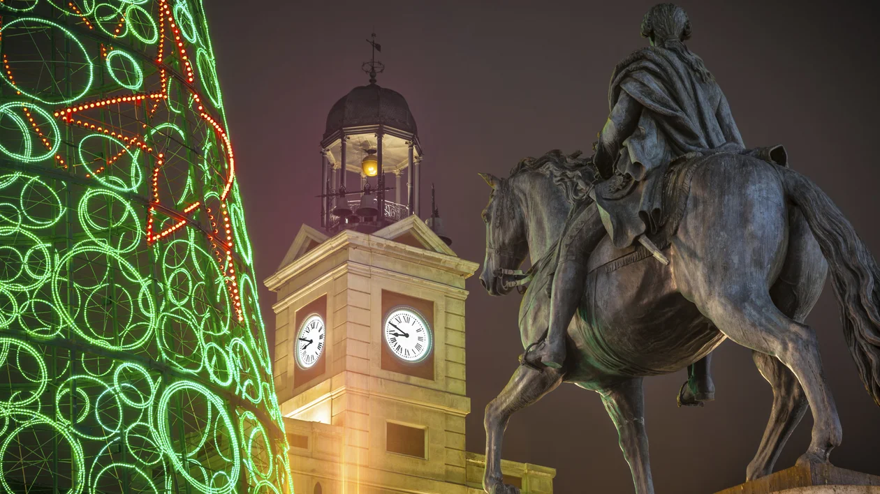 How long do the New Year celebrations last? Until your body gives up. To finish off the night, before going to bed, people like to top up their energy with traditional hot chocolate and churros. Picture: Puerta del Sol of Madrid at Christmas. ©JoseIgnacioSoto/iStock