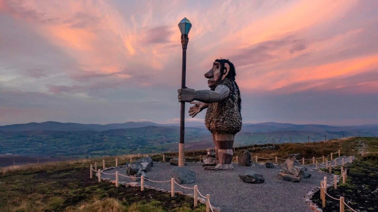 Darach the Sperrin Giant standing at the peak of the Mullaghcarn Mountain. ©Tourism Ireland