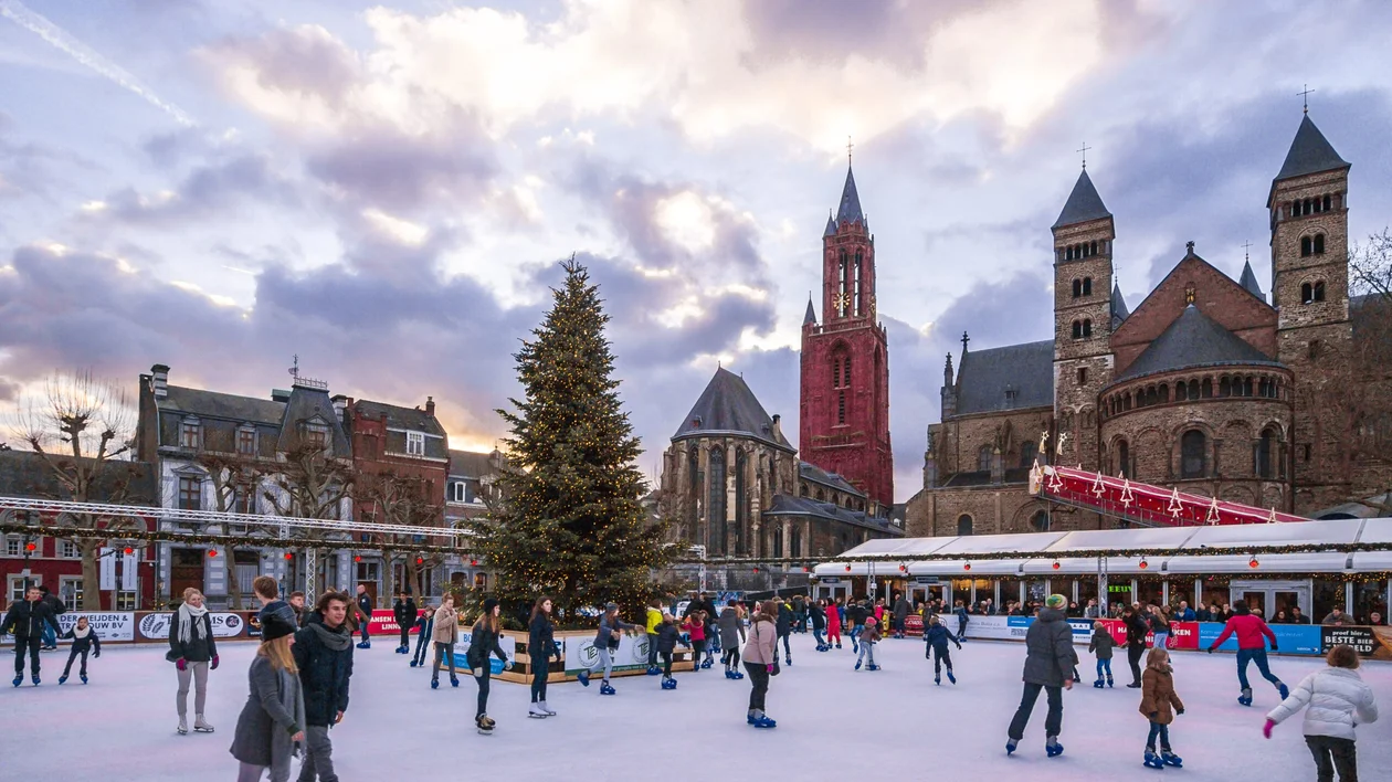 People ice skating in Maastricht, Holland. ©www.hollandfoto.net/Shutterstock.com