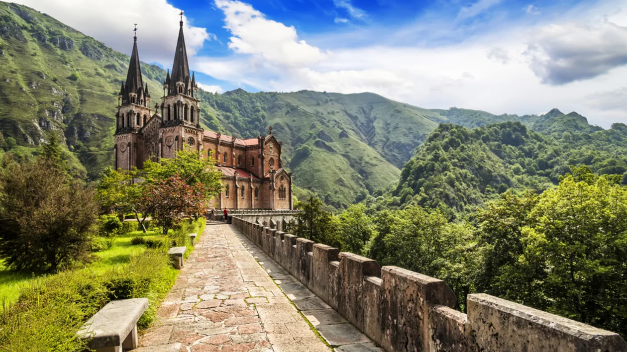 Basilica of Santa María la Real de Covadonga rises like a dream in the middle of a valley
