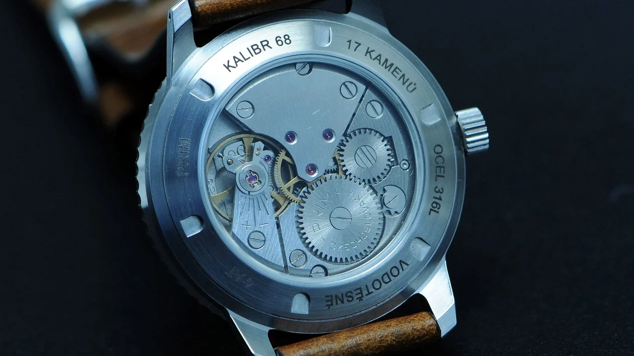 Rožnov, Czech republic - September 24 2019: classical mechanical czech watch Prim called IGEN From back side. Stainles steel case.