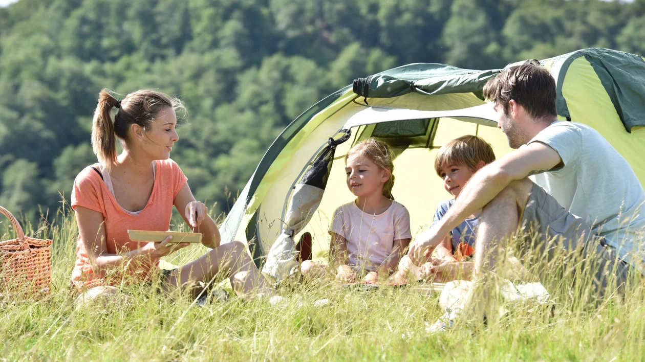 A family of four members is camping in the Czech nature.