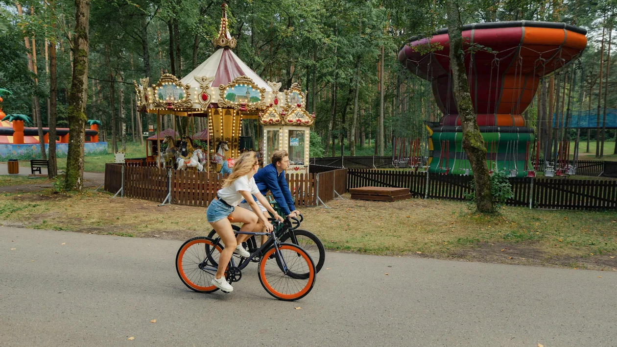 Two people cycling and doing some sports activities in Riga.