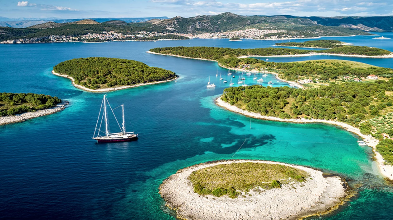 Aerial view of lush Pakleni Islands surrounded by turquoise sea.
