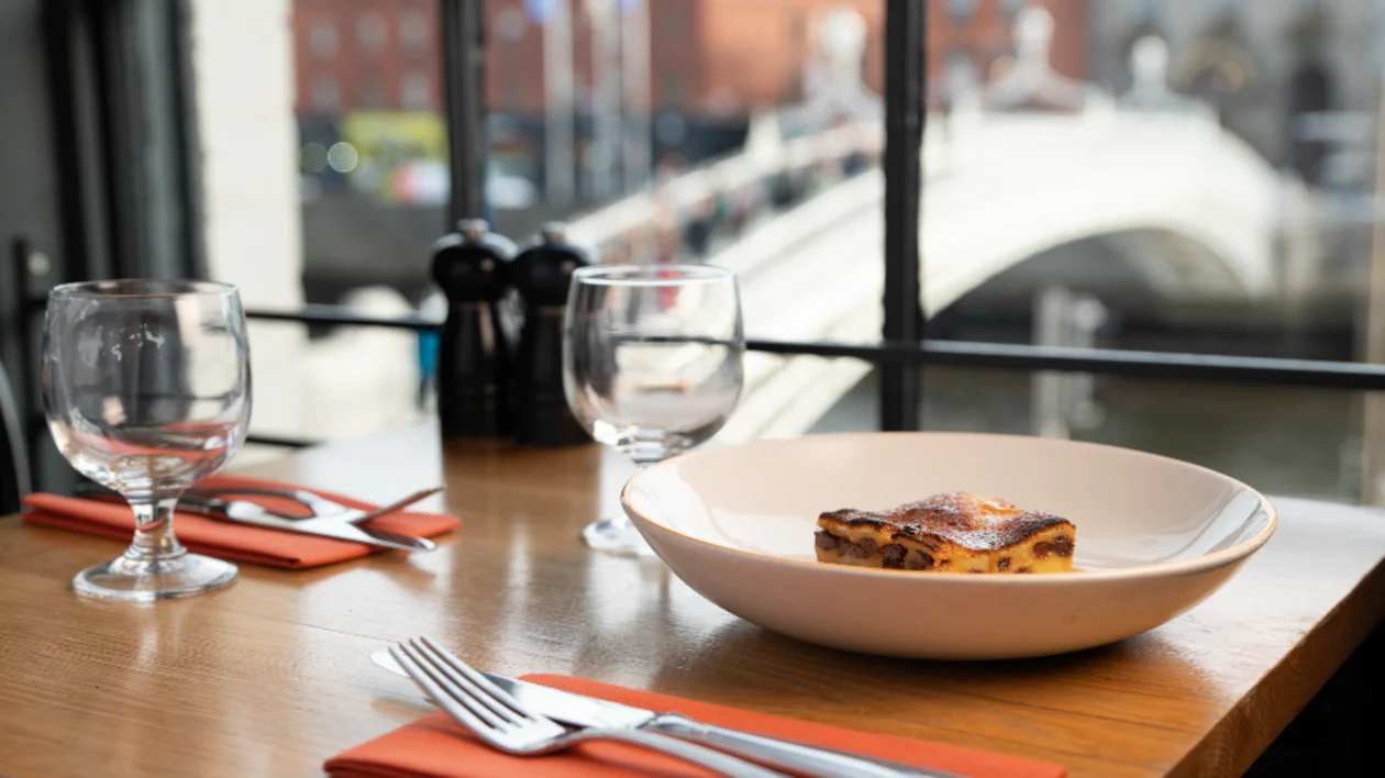 A warm slice of homemade pie at the Woollen Mills Eating House, reflecting the cozy charm of Irish dining.