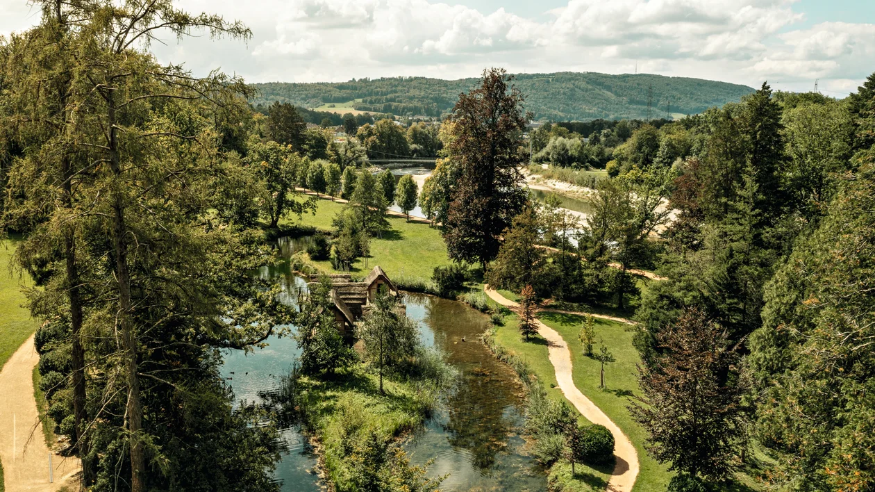 River landscape and walking paths in Bally Park, Schönenwerd
