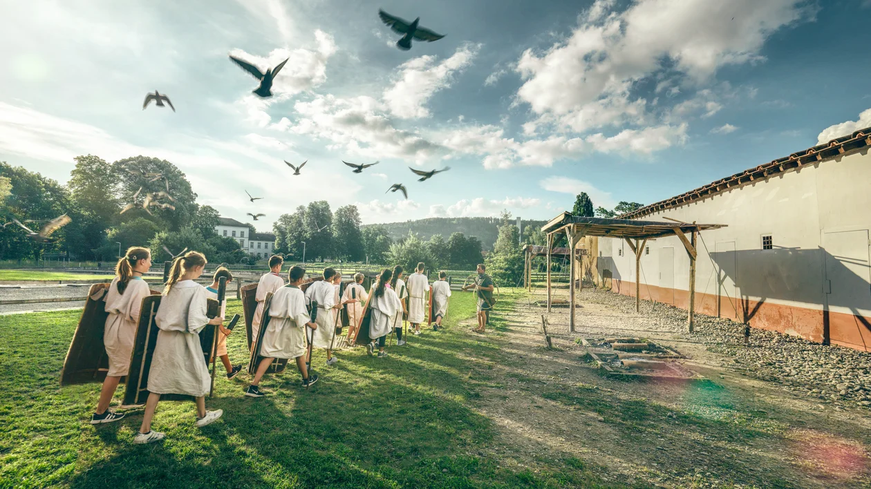 Visitors in Roman-style clothing at the Vindonissa archaeological site in Aargau