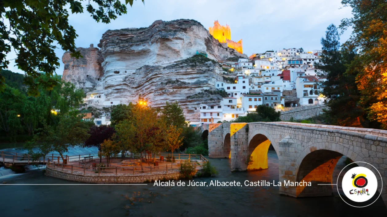 Alcalá del Júcar village and stone bridge at dusk in Castilla-La Mancha