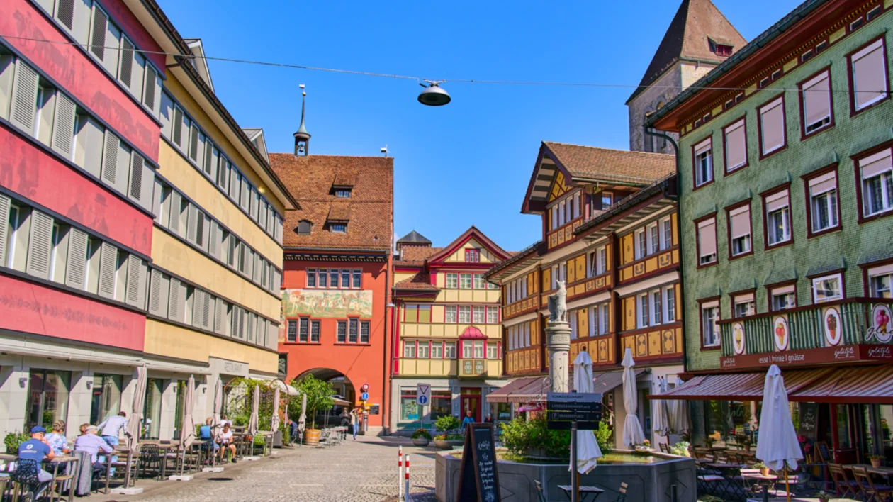 Colorful traditional buildings lining a street in Appenzell, Switzerland