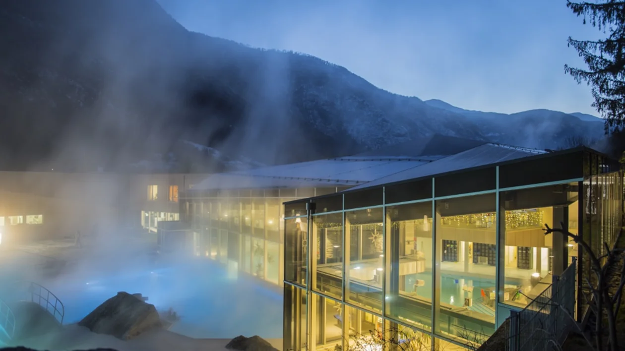 Thermal spa pools and wellness center at night in Brigerbad, Switzerland