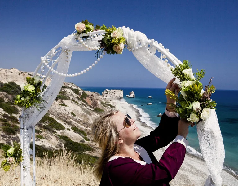 Wedding ceremony preparation next to Aphrodite's Rock