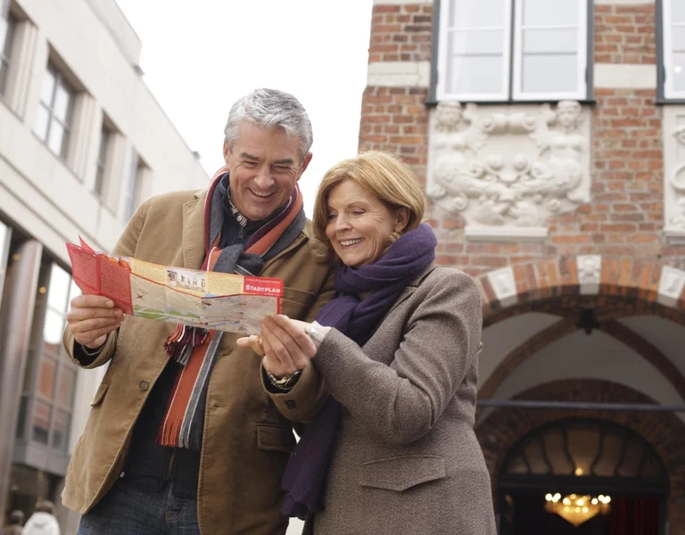 Older couple sightseeing in Lübeck