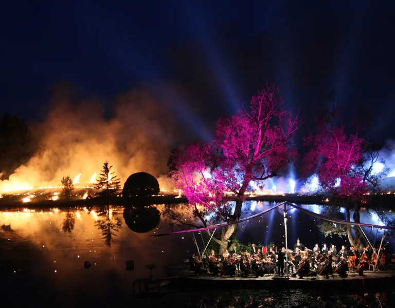 concert in estonia during night with bonfires