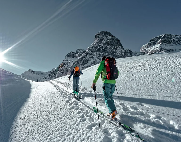 hiking in snowy mountains