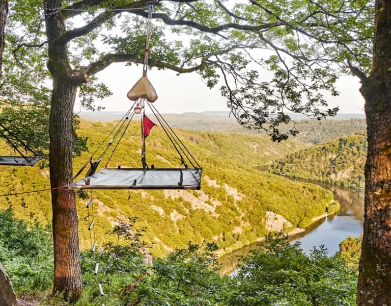 Nature, trees and a hanging platform to camp in Germany.