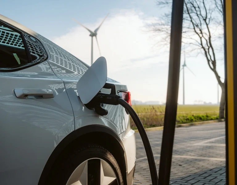 Electric car with a blue sky in the Netherlands.