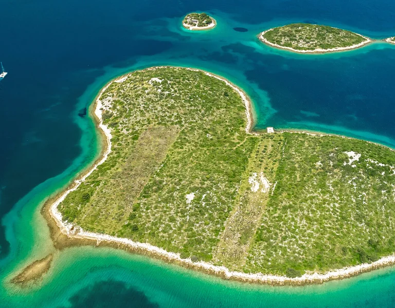 Heart-shaped island surrounded by turquoise sea