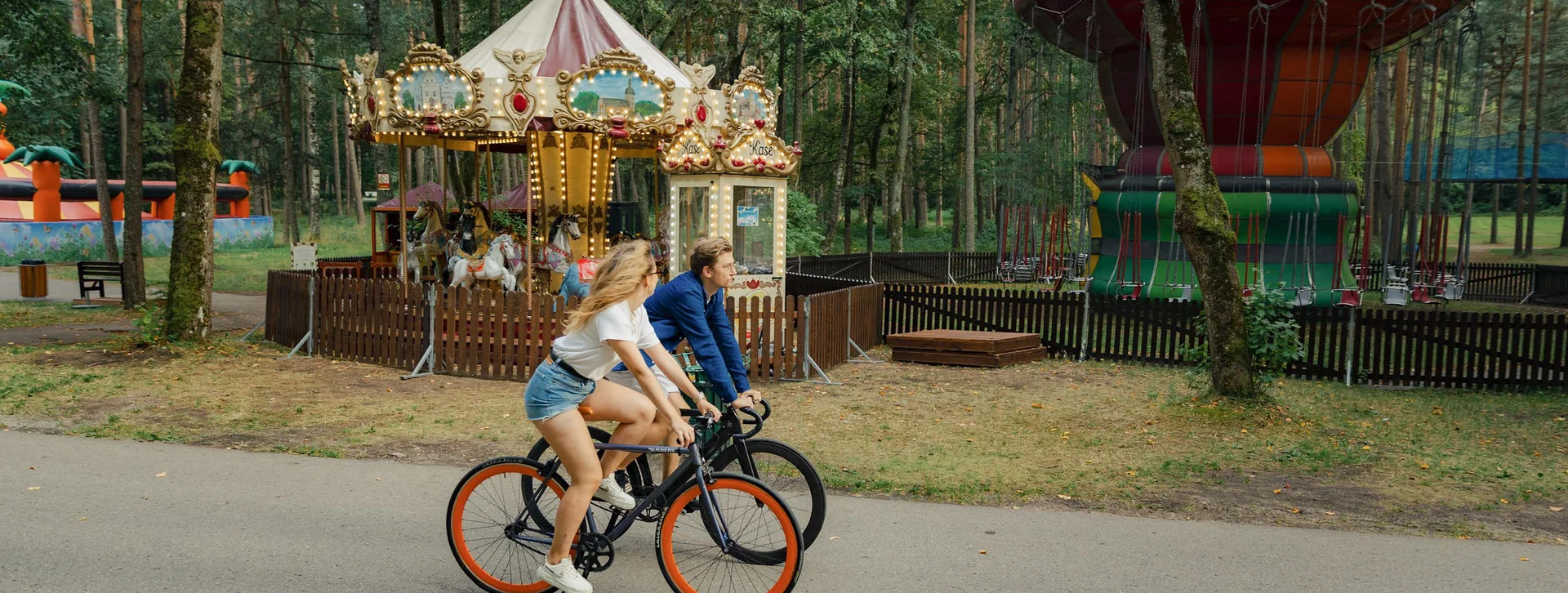 Two people cycling and doing some sports activities in Riga.