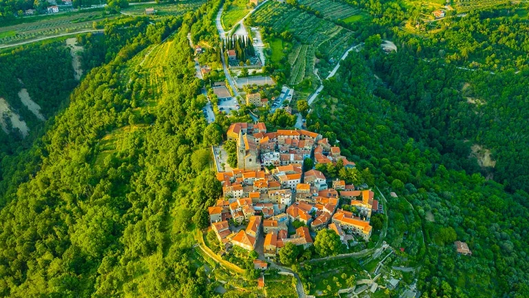 Visit the Grožnjan, built atop a green hill perhaps by a giant!