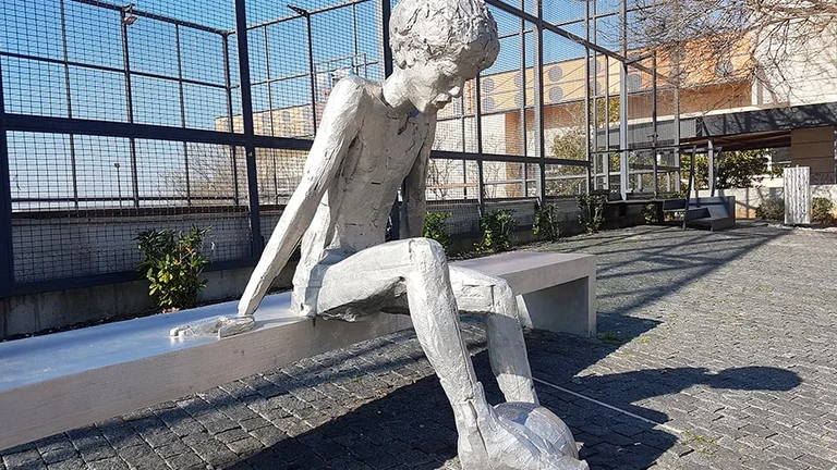 Visit the statue or Dražen Petrović in Šibenik.