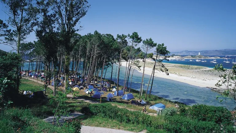 Pitch up at Islas Cies under the palm trees for an idyllic camping getaway.