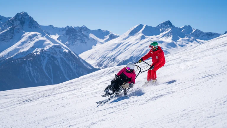 Ski Switzerland using adaptive equipment for barrier-free fun on the slopes.