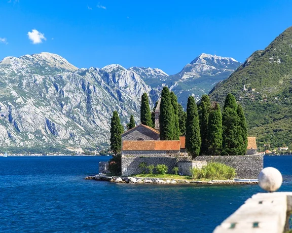 Stunning views will dazzle you as you approach the Church of St George on its island near Perast.